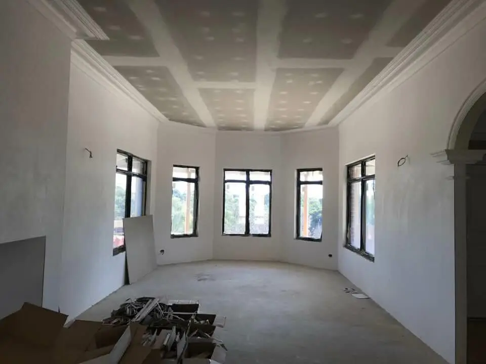 Freshly painted interior shell with tall windows