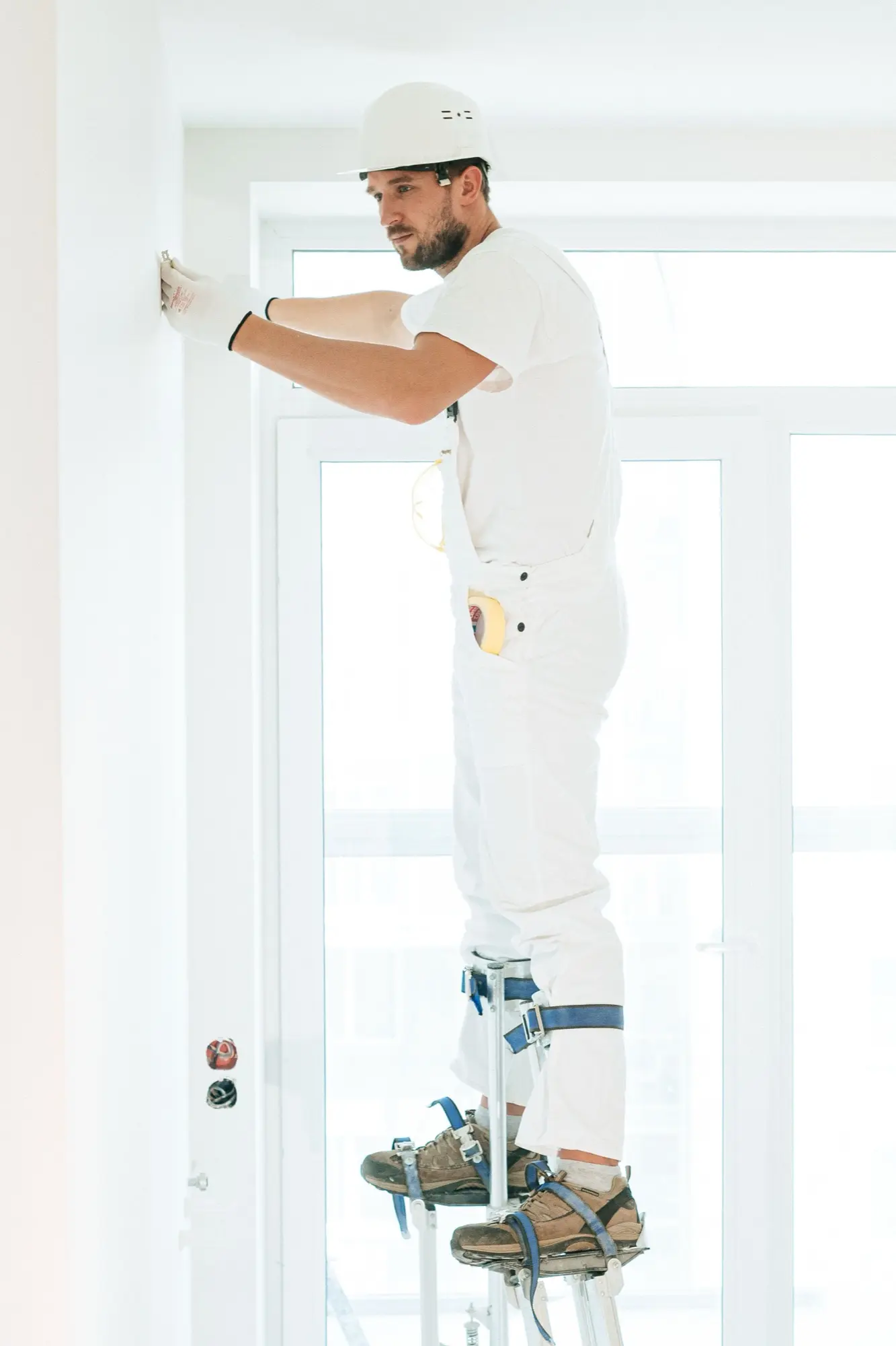 Painting a high wall on stilts in a Fairfield property
