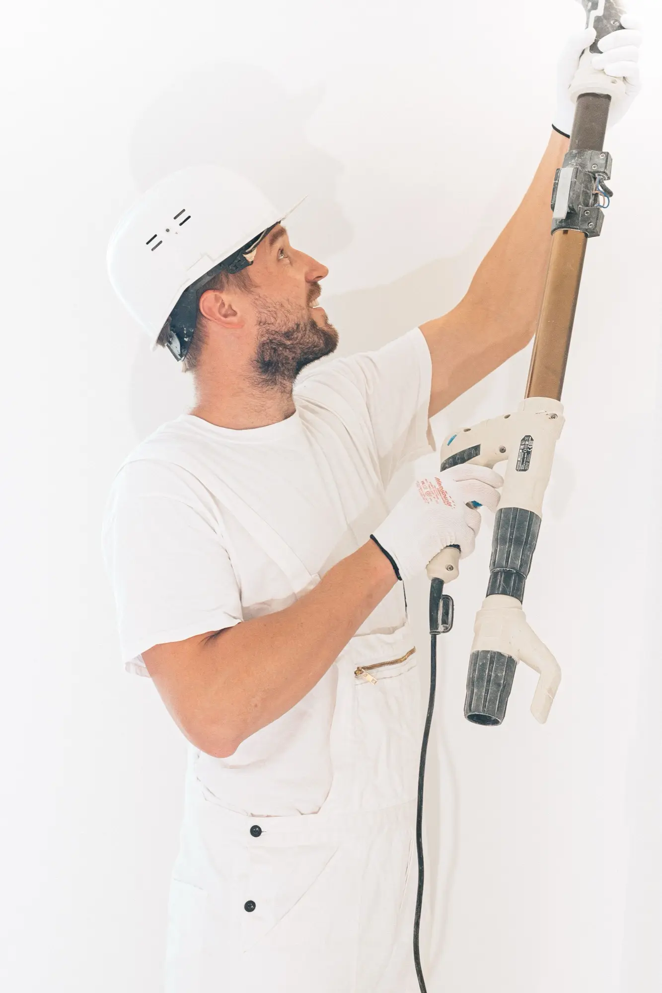 Spray finishing a large wall area in a Wetherill Park unit